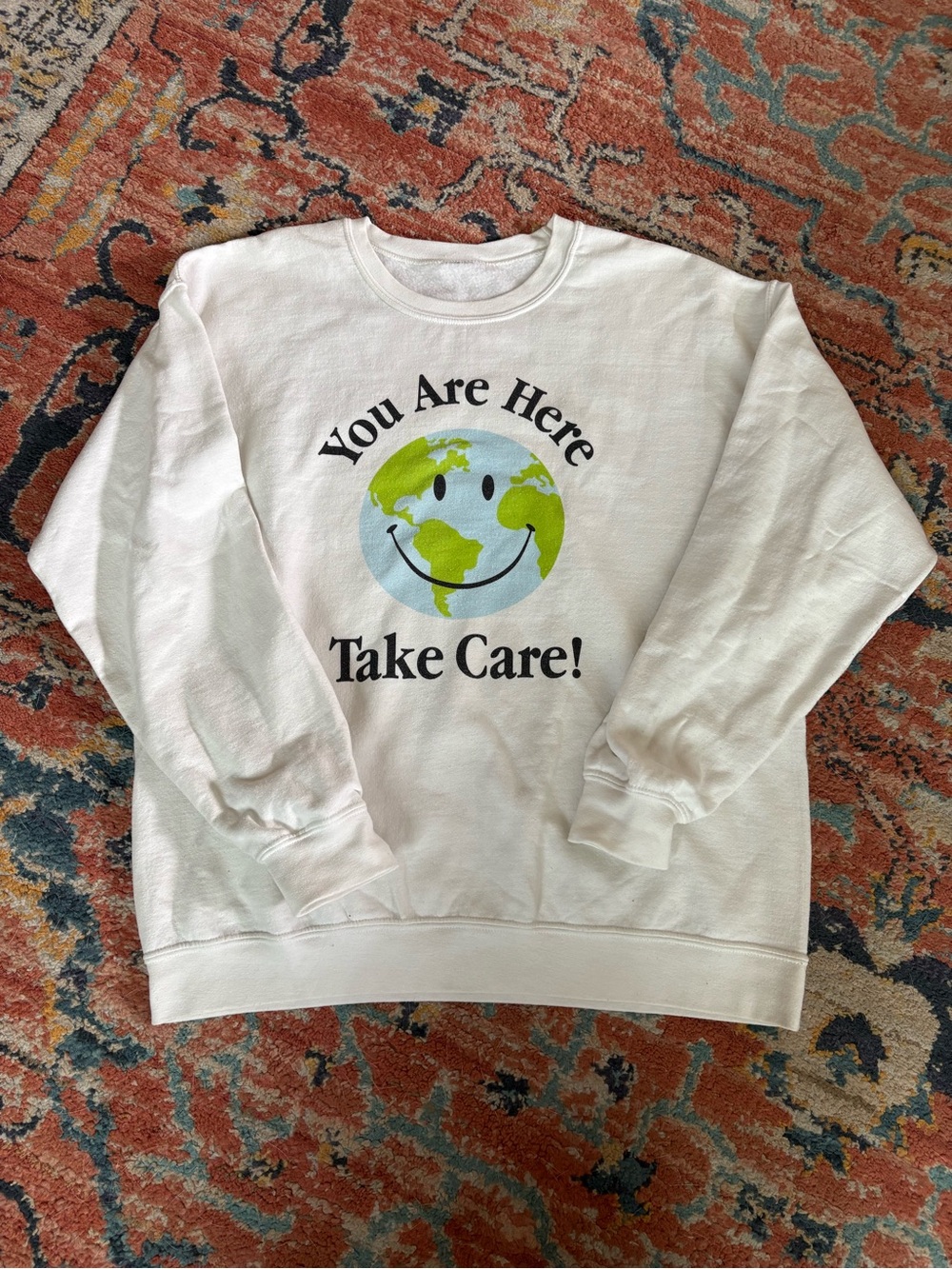 You Are Here "Take Care" White Graphic Crewneck Sweatshirt